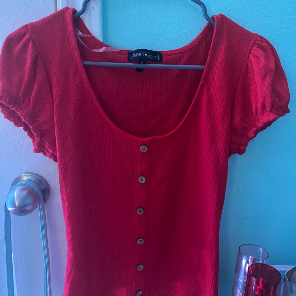 A red button down shirt